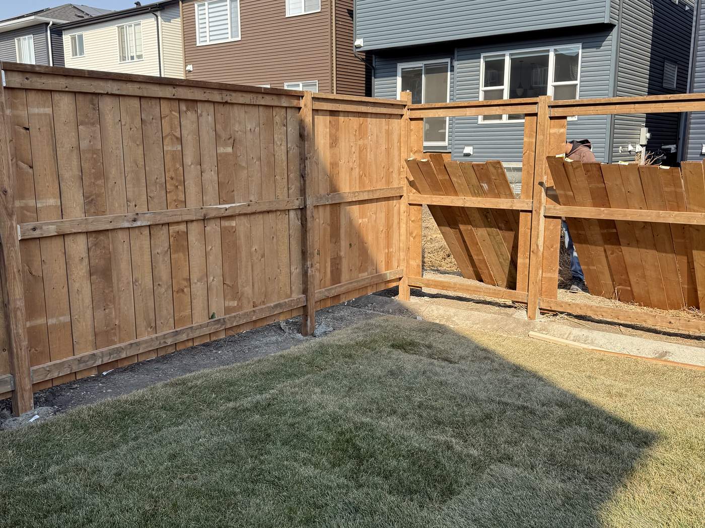 New fence and fresh sod